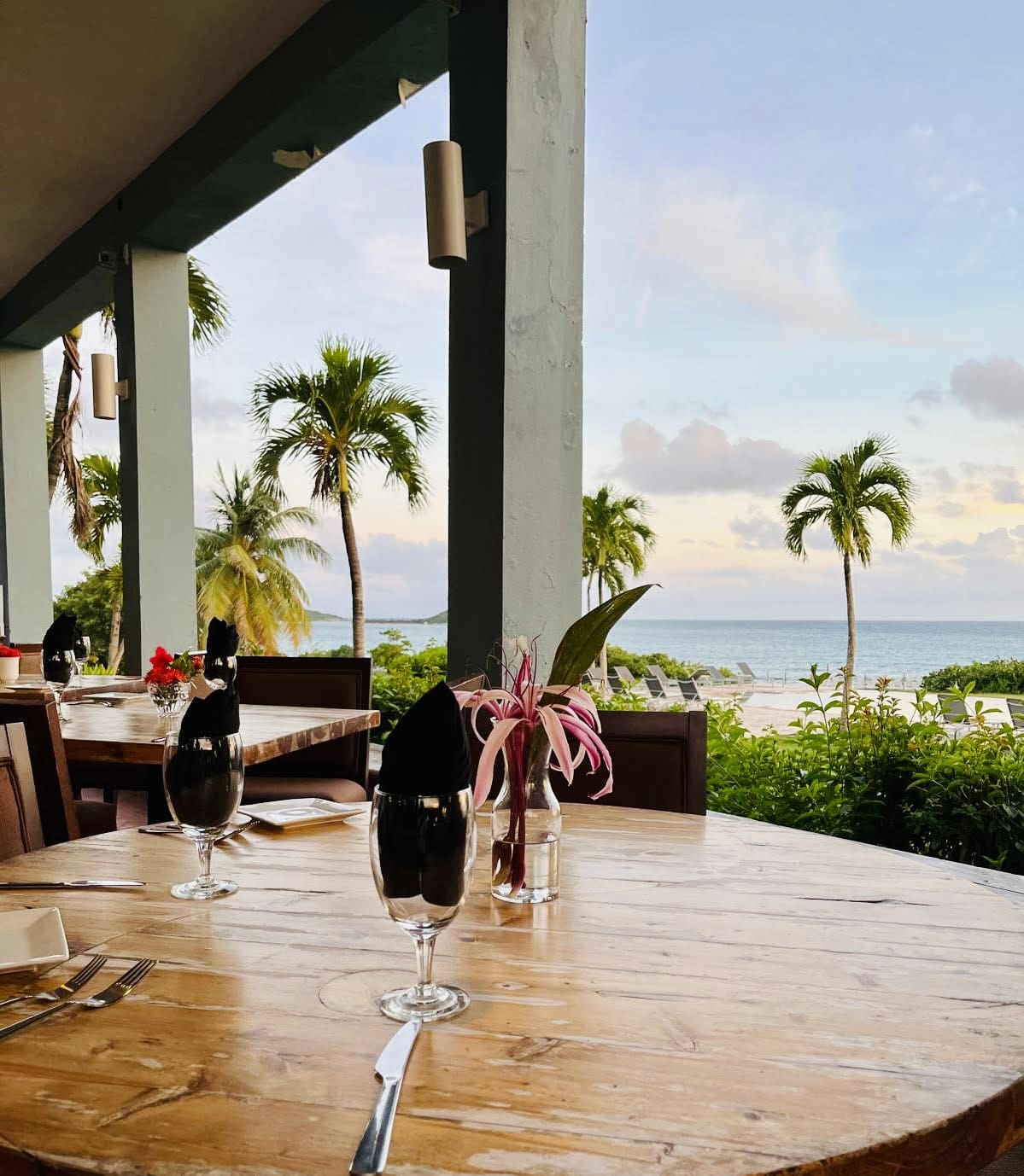 Oceanfront sunset dinner table at Carambola at the Blue, Vieques — anniversary and intimate celebration dining format